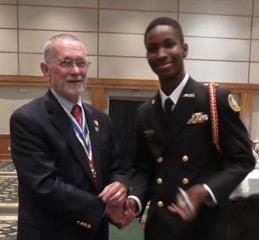 Rolf Maris, New Bern Chapter President, and awardee, Havelock High School cadet, Michael Williams.